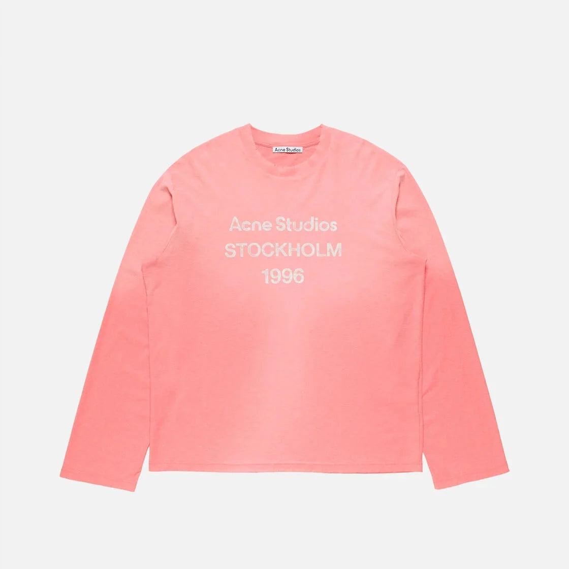 Acne Studios 1996 Sweater in pink, flat lay.