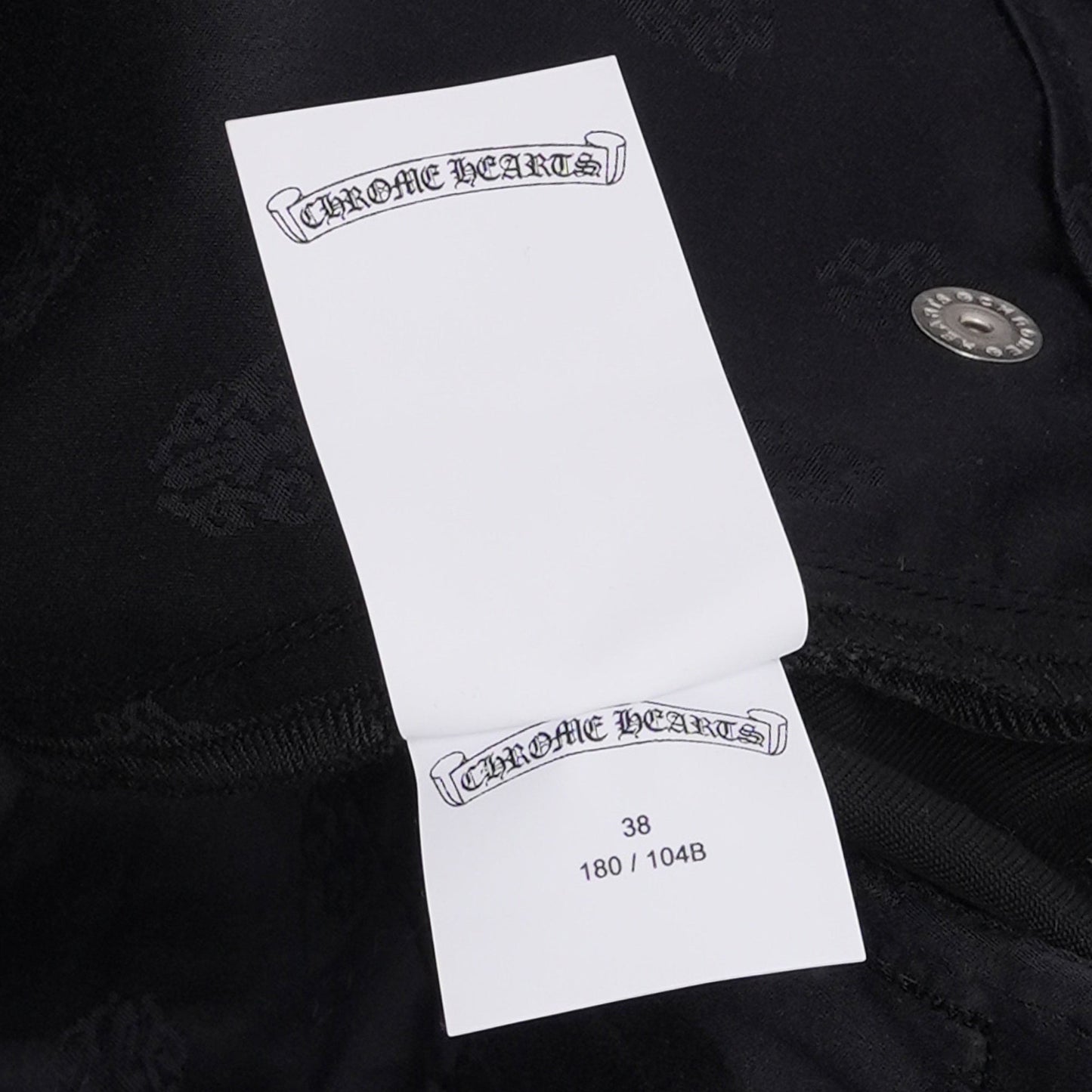 OFFCODE.USA black 100% cotton Flare Richard Cut Chino Pants with subtle all-over logo pattern.