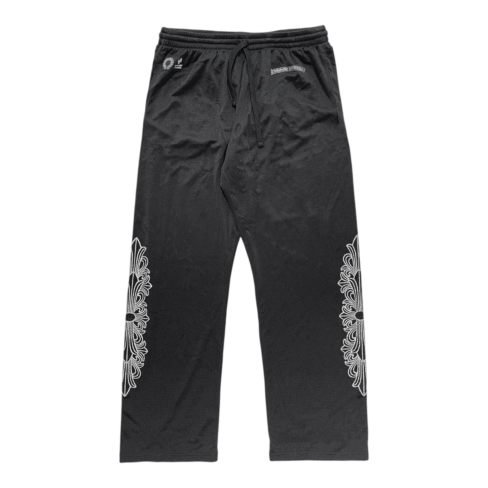 OFFCODE.USA black mesh varsity pants featuring white floral cross graphics on the legs and an elastic drawstring waist.