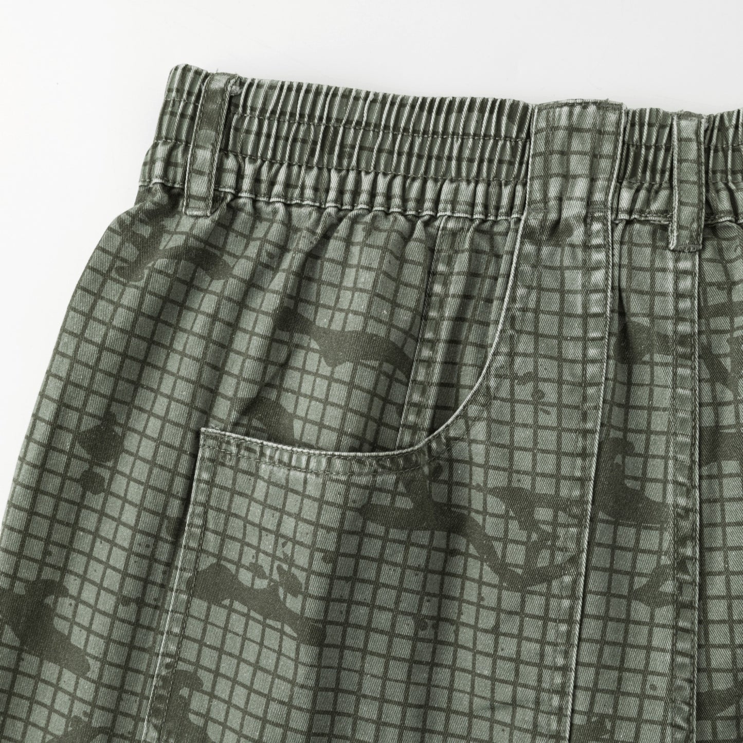 OFFCODE.USA Grid Camo Shorts in green cotton with a baggy, wide-leg fit and signature back pocket.
