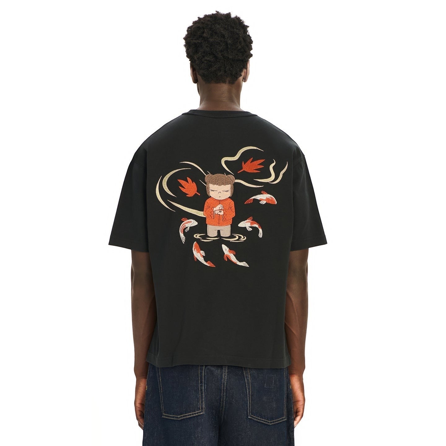 OFFCODE.USA black 100% cotton t-shirt with embroidered koi fish and autumn leaves graphic on back. Model wears size L.