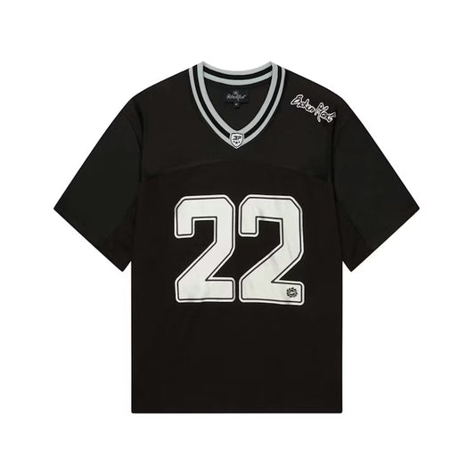 Broken Planet football jersey in black and silver, front view