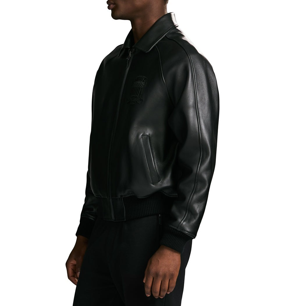 OFFCODE.USA Avirex Icon black leather bomber jacket with logo details, zip front, and ribbed cuffs and hem.