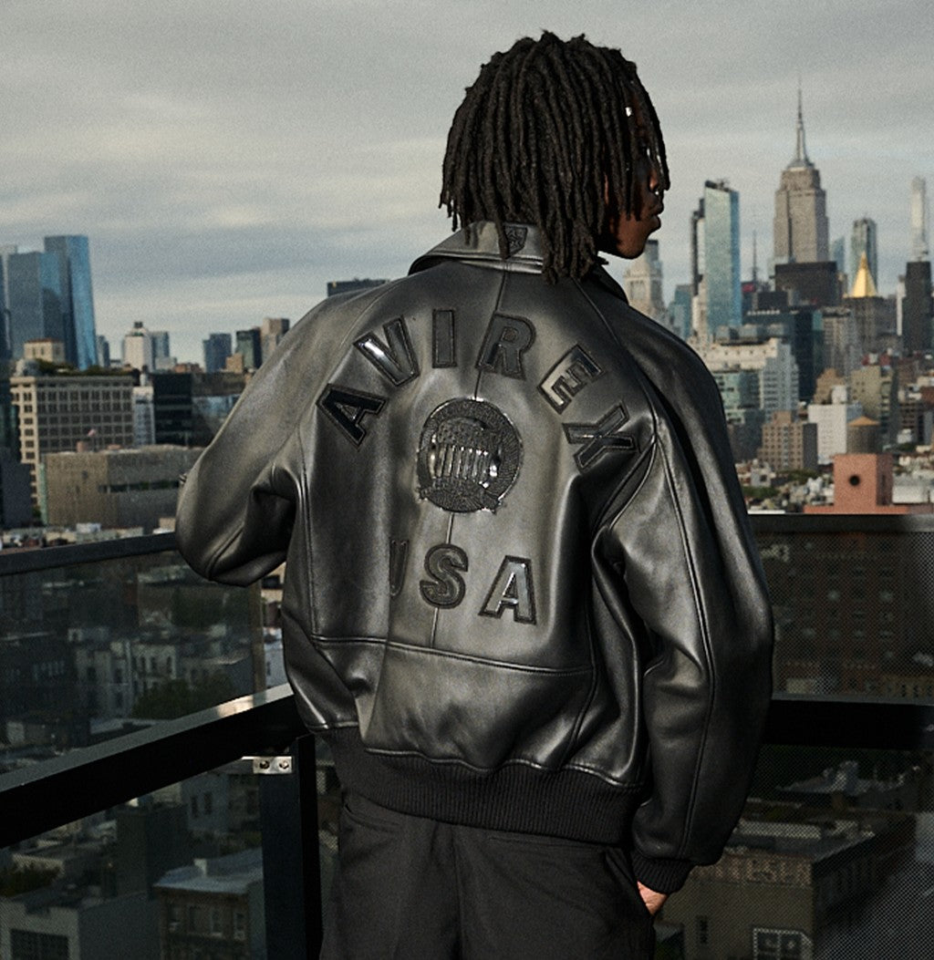 OFFCODE.USA black antique lamb leather bomber jacket with Avirex logo details on back and front.