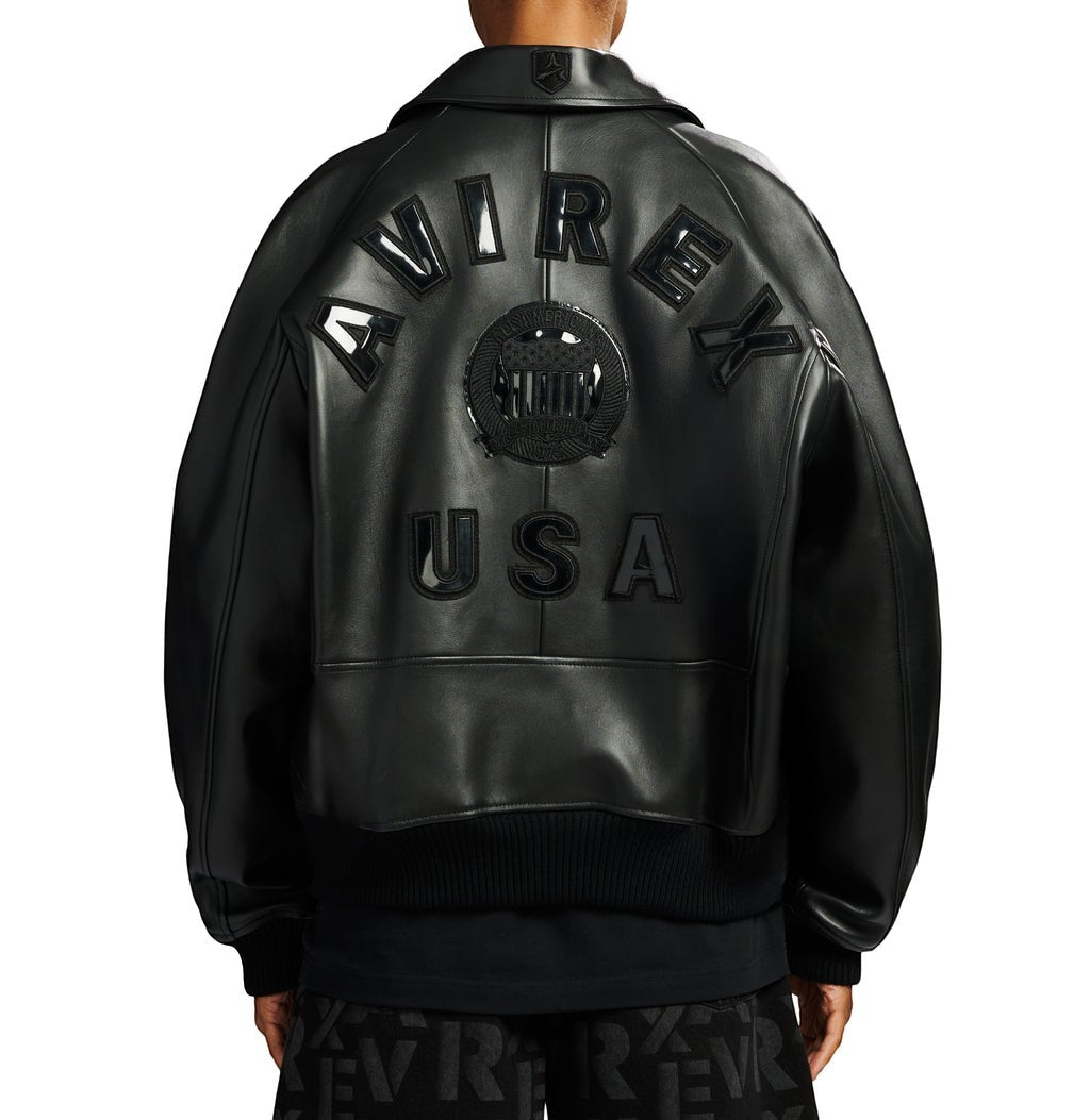 OFFCODE.USA black antique lamb leather bomber jacket with "AVIREX USA" logo details on back, ribbed hem and cuffs.