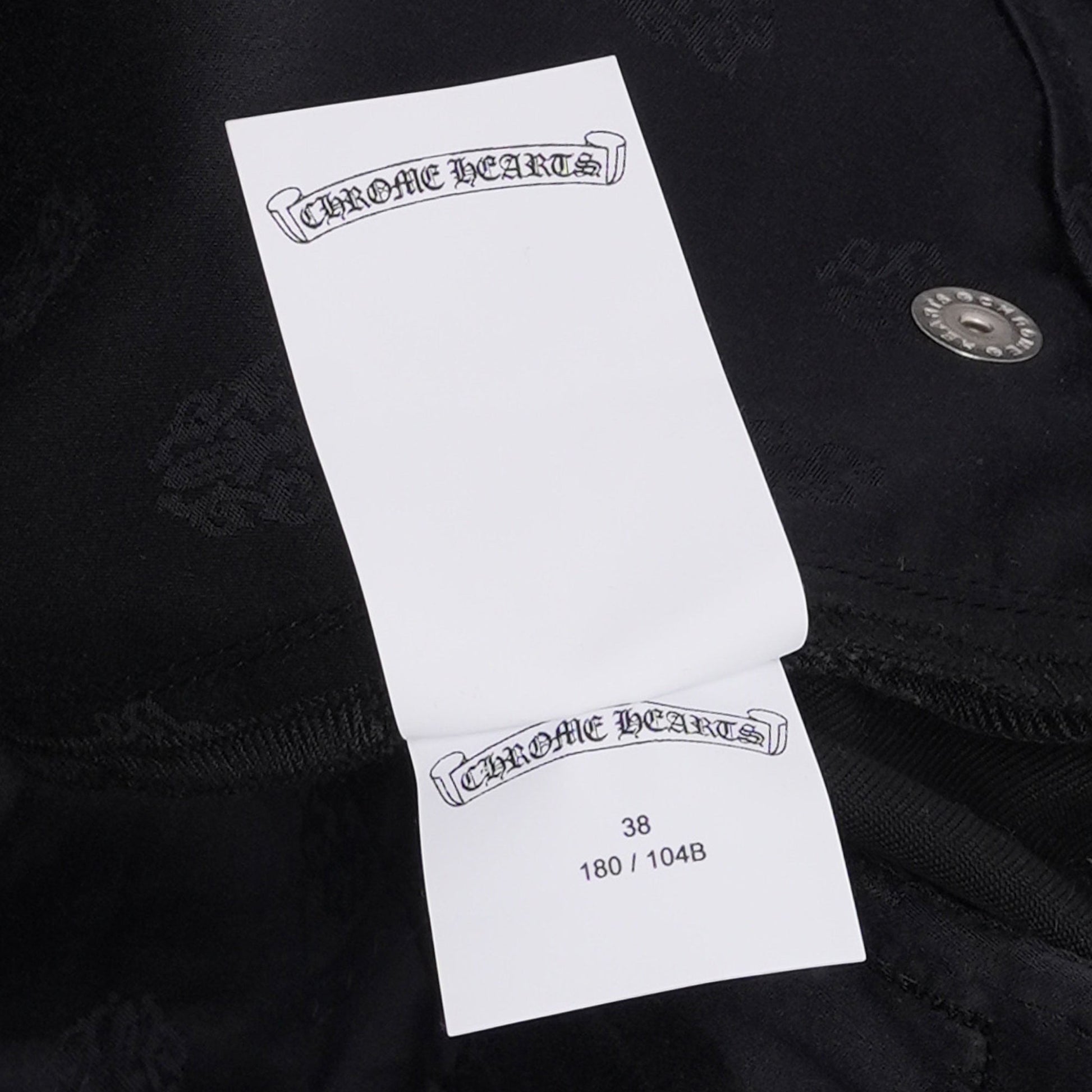 OFFCODE.USA black 100% cotton Flare Richard Cut Chino Pants with subtle all-over logo pattern.