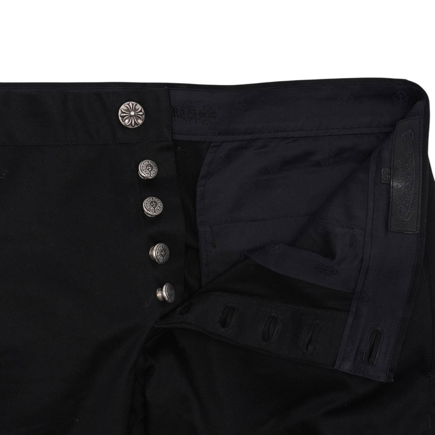 OFFCODE.USA black cotton chino pants with button fly and decorative silver buttons.