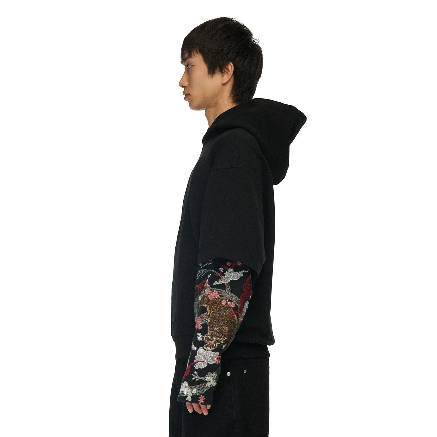 OFFCODE.USA black cotton hoodie with double sleeves featuring intricate Yakuza-inspired embroidery on the inner sleeves.