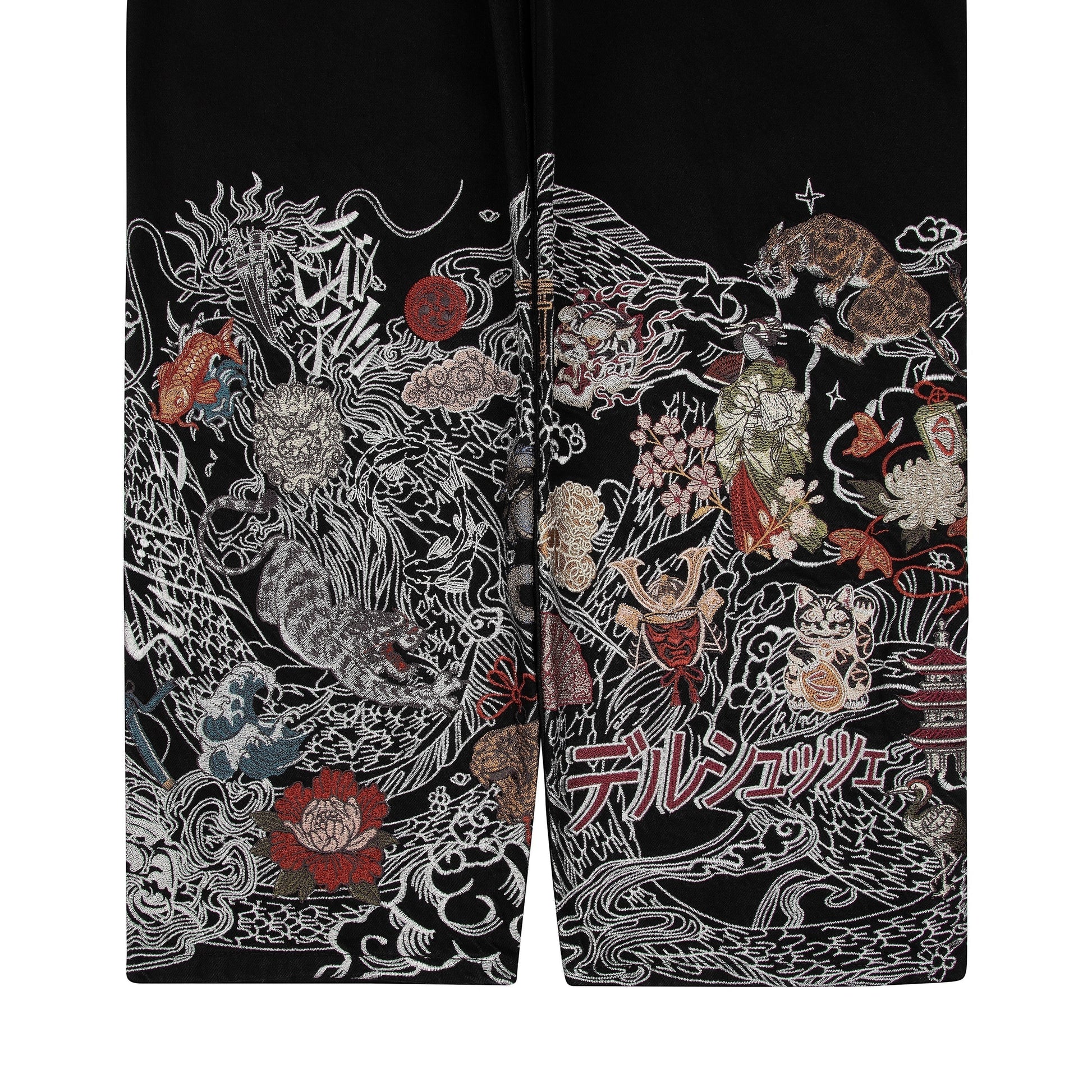 OFFCODE.USA black denim pants with intricate Japanese-style embroidery of dragons, tigers, samurai, and flowers. 100% cotton.