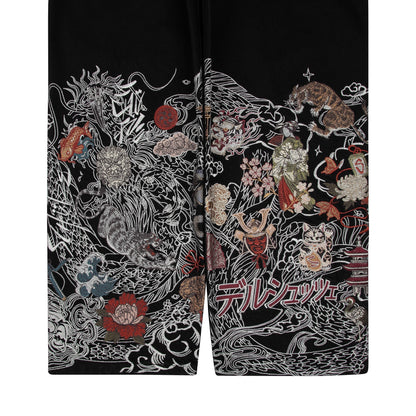 OFFCODE.USA black denim pants with intricate Japanese-style embroidery of dragons, tigers, samurai, and flowers. 100% cotton.