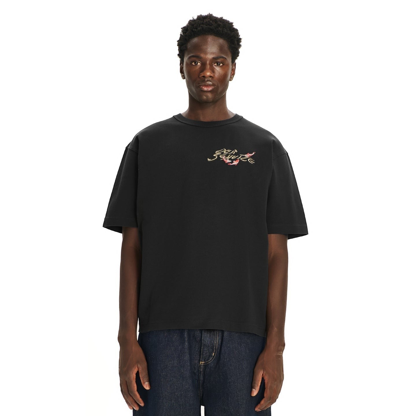 OFFCODE.USA black 100% cotton t-shirt with embroidered koi design on front. Model wears size L.