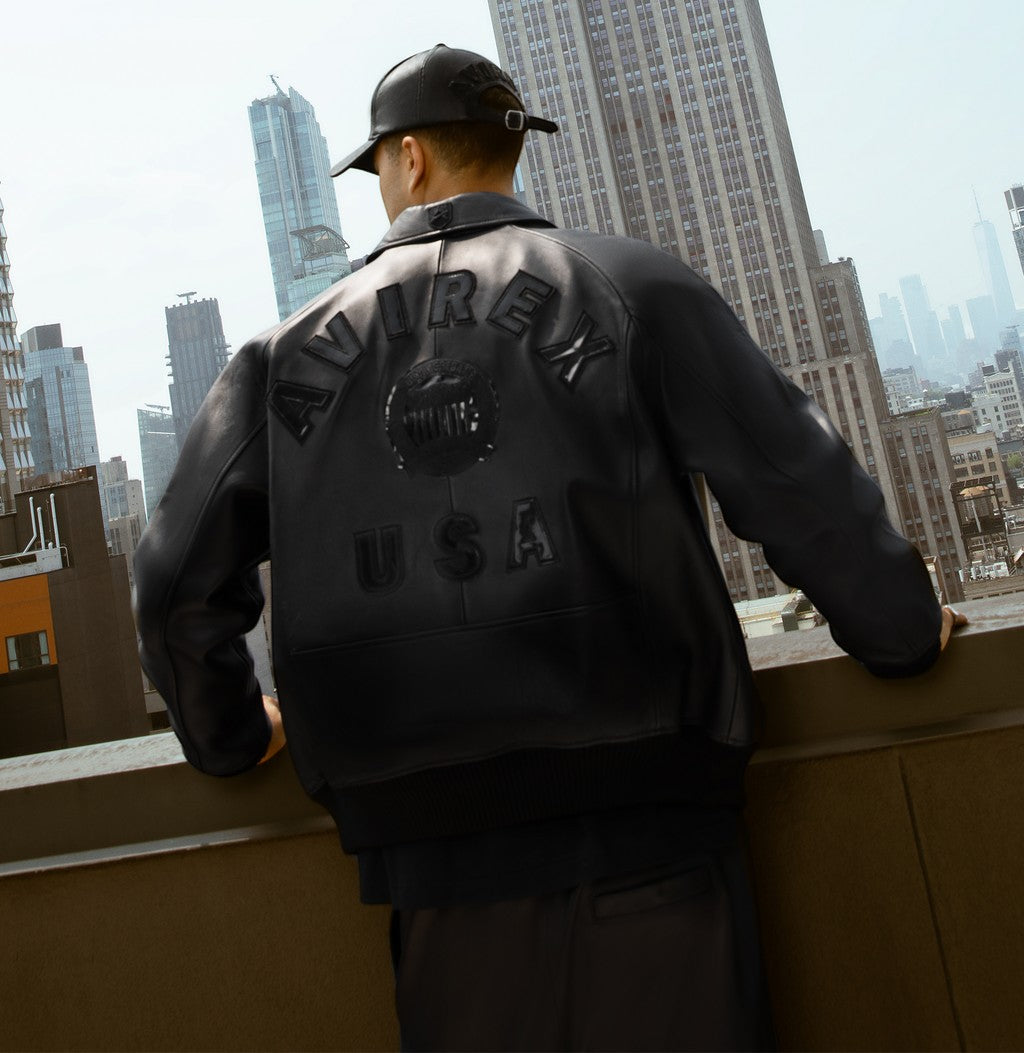 OFFCODE.USA black antique lamb leather bomber jacket with logo details on back and chest. Ribbed hem and cuffs.
