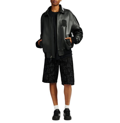 OFFCODE.USA black antique lamb leather bomber jacket with logo details, zip front, and striped rib hem/cuffs.