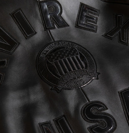 OFFCODE.USA black leather bomber jacket with embroidered logo patch and raised lettering.