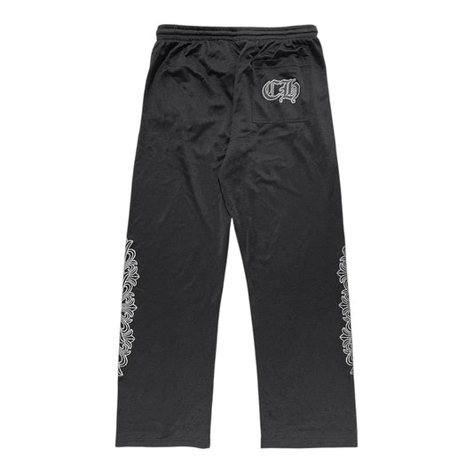 OFFCODE.USA black mesh varsity pants featuring white gothic CH logo on back pocket and floral side leg detailing