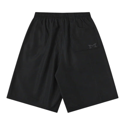 OFFCODE.USA black tech shorts with mesh lining, interior drawcord, hidden zipper pockets, and signature panelling. Baggy fit.