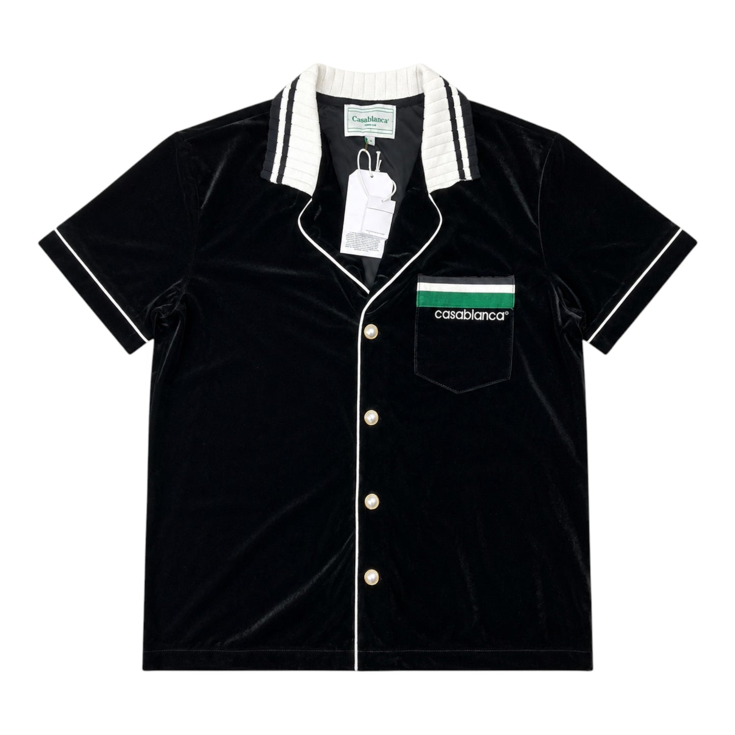 OFFCODE.USA black velour short-sleeved shirt with white piping, pearl buttons, and chest pocket with green and white logo.