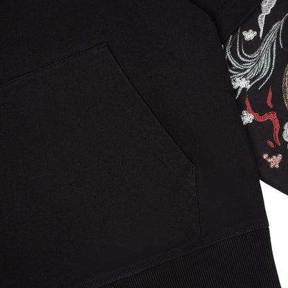 OFFCODE.USA black cotton hoodie with intricate "yakuza" embroidery on the sleeves. Features a front pocket and double sleeves.