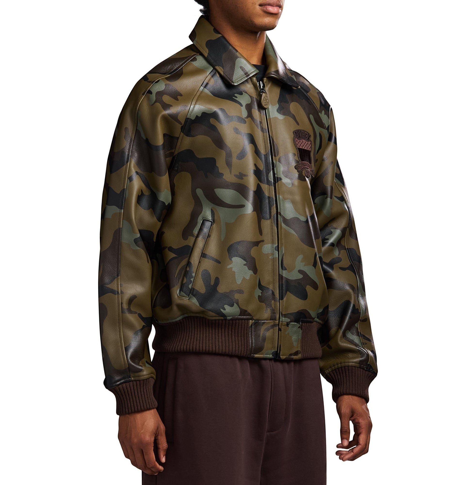 OFFCODE.USA Limited Edition Camo Icon Bomber Jacket in 100% goat leather with tonal camo print and logo details.