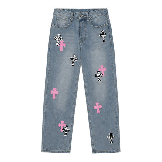 OFFCODE.USA Chrome Hearts Levi's jeans in light wash denim featuring pink and zebra print cross patches.