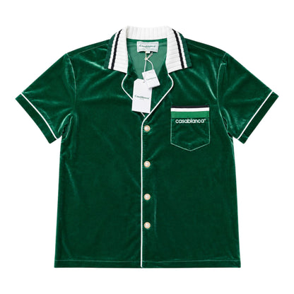 OFFCODE.USA green velour short-sleeved shirt with white piping and Casablanca logo on chest pocket.