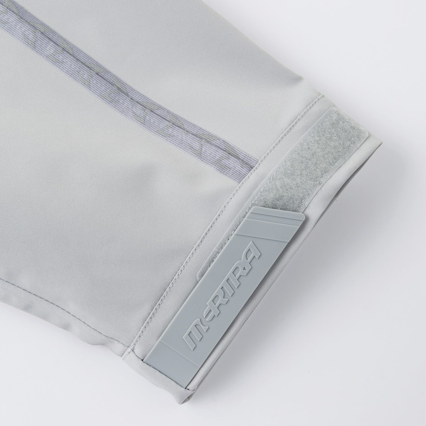 OFFCODE.USA grey 3L polyamide shell jacket with glow in the dark taped seams and adjustable velcro cuff.