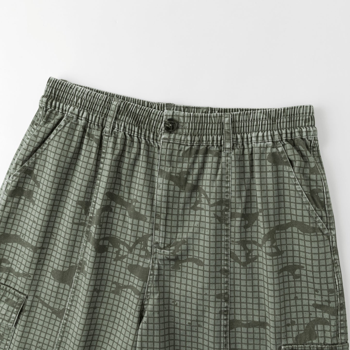 OFFCODE.USA Grid Camo Shorts in 100% cotton with a grid camo print, tortoise shell button, and YKK fly zipper.
