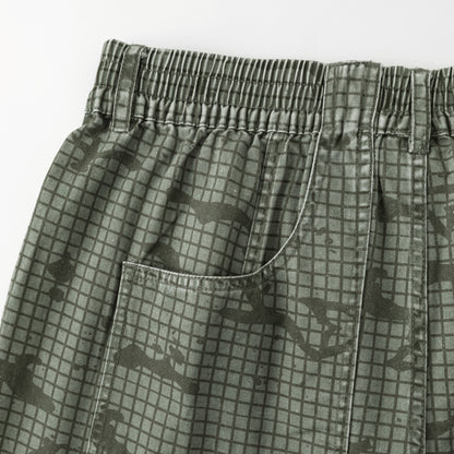 OFFCODE.USA Grid Camo Shorts in green cotton with a baggy, wide-leg fit and signature back pocket.