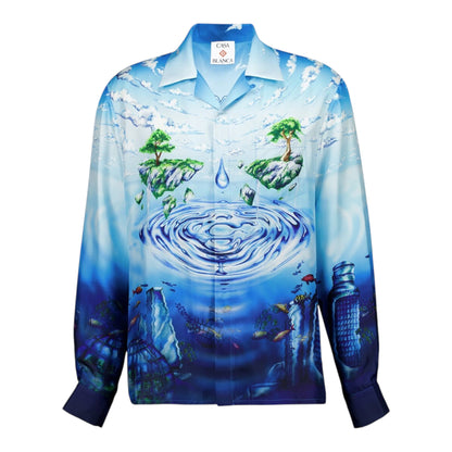 OFFCODE.USA Lost Atlantis silk Cuban shirt with a surreal digital print of floating islands and oceanic life in Atlantis Blue.