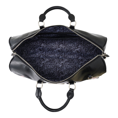 OFFCODE.USA MERTRA x Slawn Duffle bag made of black PU leather with a unique Olaolu Slawn artwork lining. Features carry handles and a detachable strap.