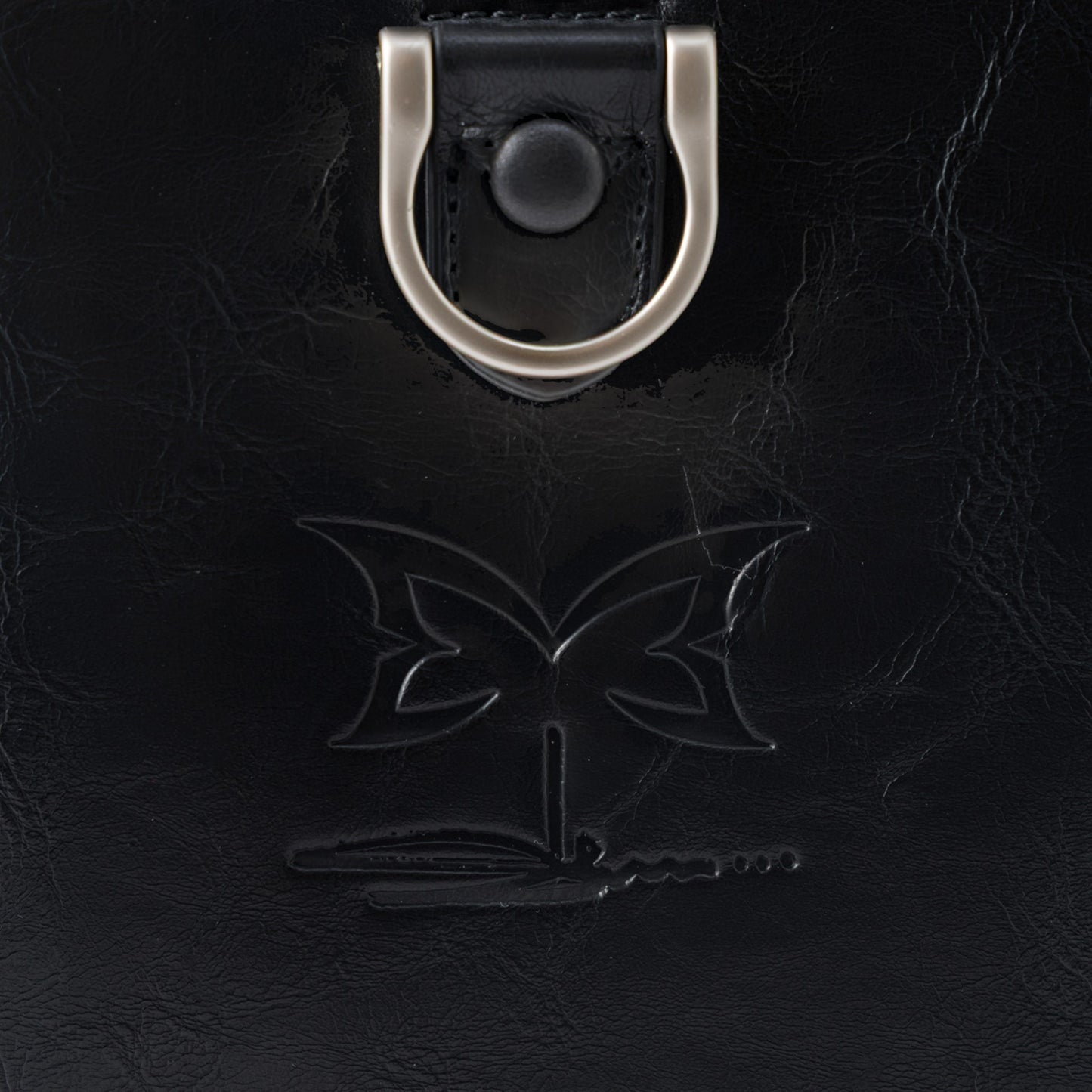 OFFCODE.USA MERTRA x Slawn Duffle bag in black PU leather with debossed butterfly graphic and metal hardware.