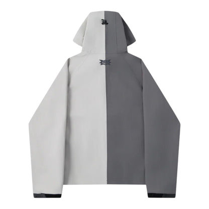OFFCODE.USA MERTRA x Umbro Water Reactive Jacket in split grey and dark grey with hood and logo detail.