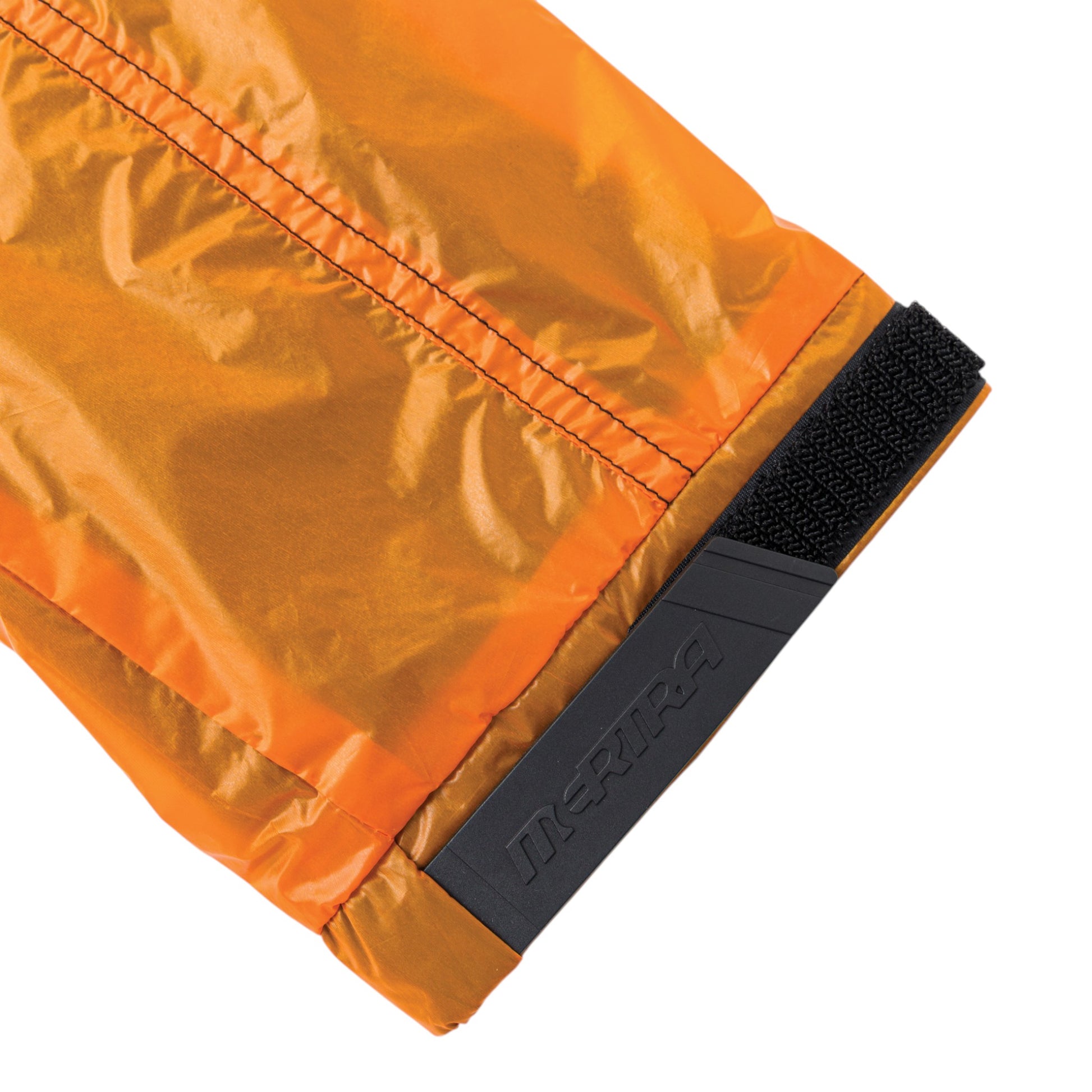 OFFCODE.USA orange translucent nylon jacket with mesh lining, hood toggles, waist toggles, and velcro wrist tighteners.