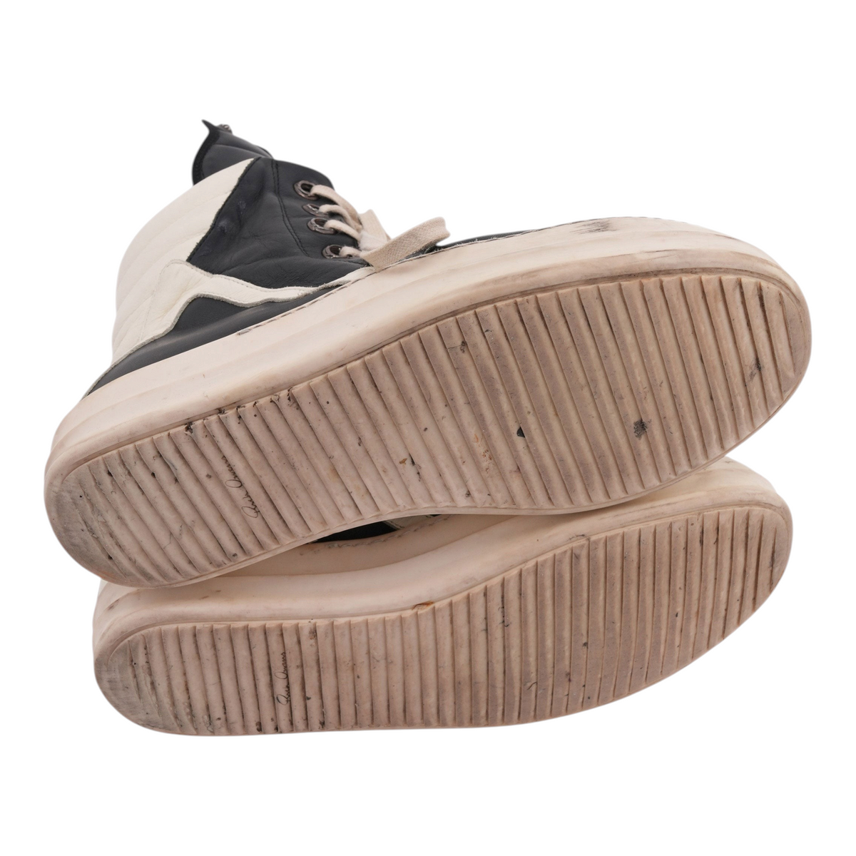 OFFCODE.USA Rick Owens Geobasket sneakers in black leather showing the rubber soles with signature branding