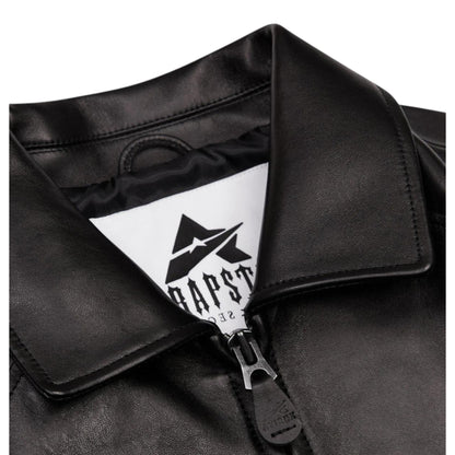OFFCODE.USA Trapstar X Avirex Icon Leather Jacket in black. Features a zip closure and branded label.