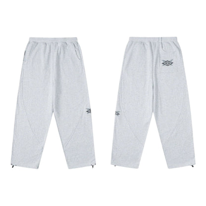 OFFCODE.USA MERTRA x Umbro light grey marl joggers with embroidered logo detail and drawstring cuffs.