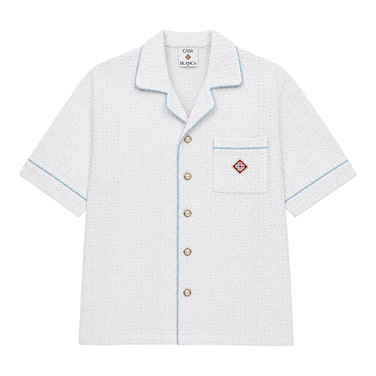 OFFCODE.USA White towelling short sleeve shirt with blue piping and embroidered monogram detail on chest pocket.