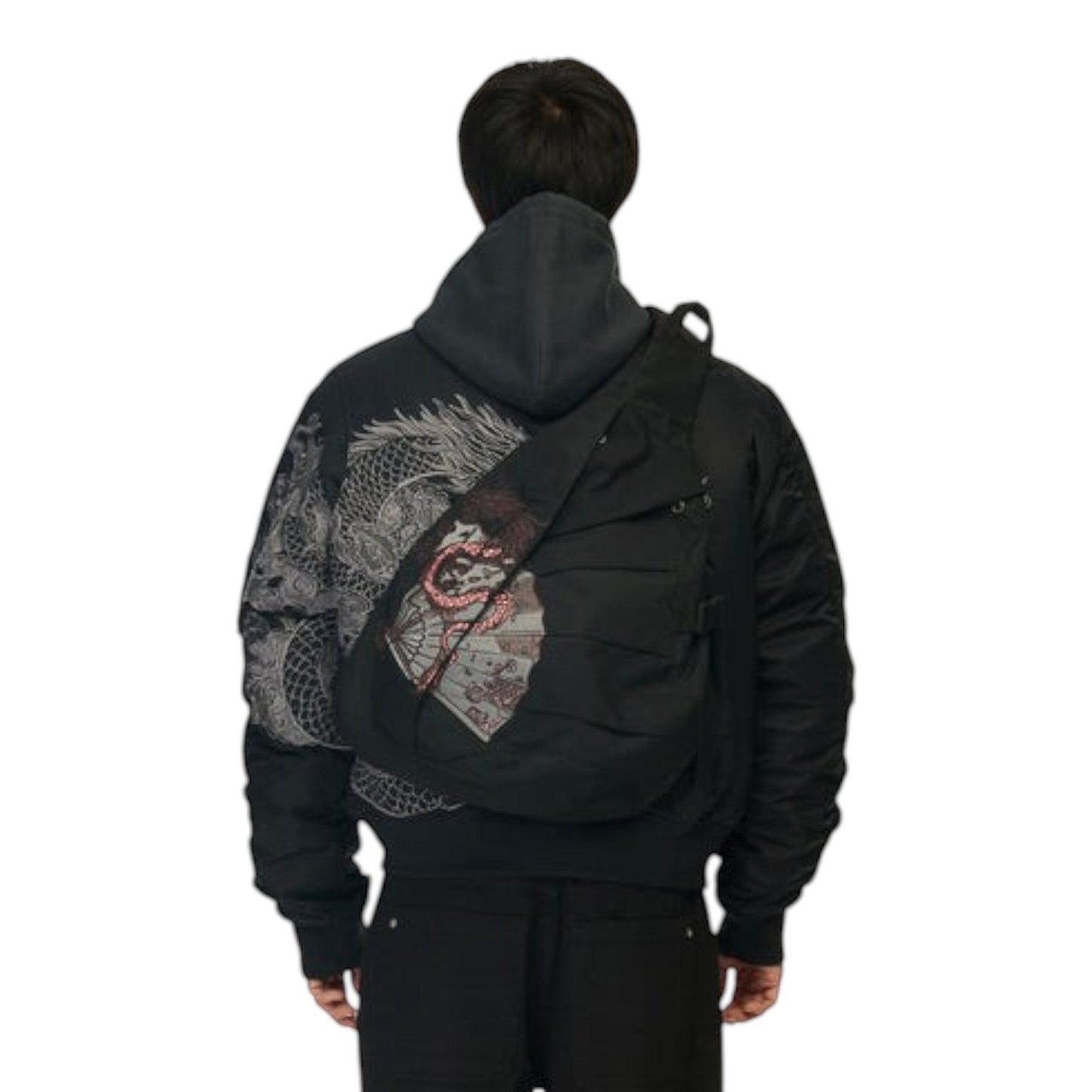 OFFCODE.USA black canvas yakuza sling bag with front embroidery, buckle closure, and adjustable strap worn on back