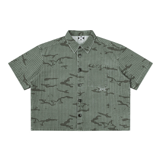 OFFCODE.USA green cotton grid camo print short sleeve shirt with embroidered logos and tortoise shell buttons.