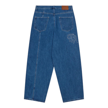 OFFCODE.USA Bigstep Denim blue jeans with baggy wide leg fit, rice embroidered graphics, signature panelling, and leather tab.