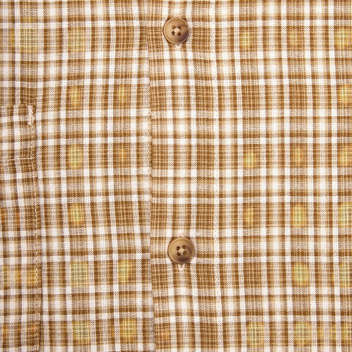OFFCODE.USA Australiana Plaid Shirt in brown and white plaid pattern with two button closures.