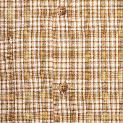 OFFCODE.USA Australiana Plaid Shirt in brown and white plaid pattern with two button closures.