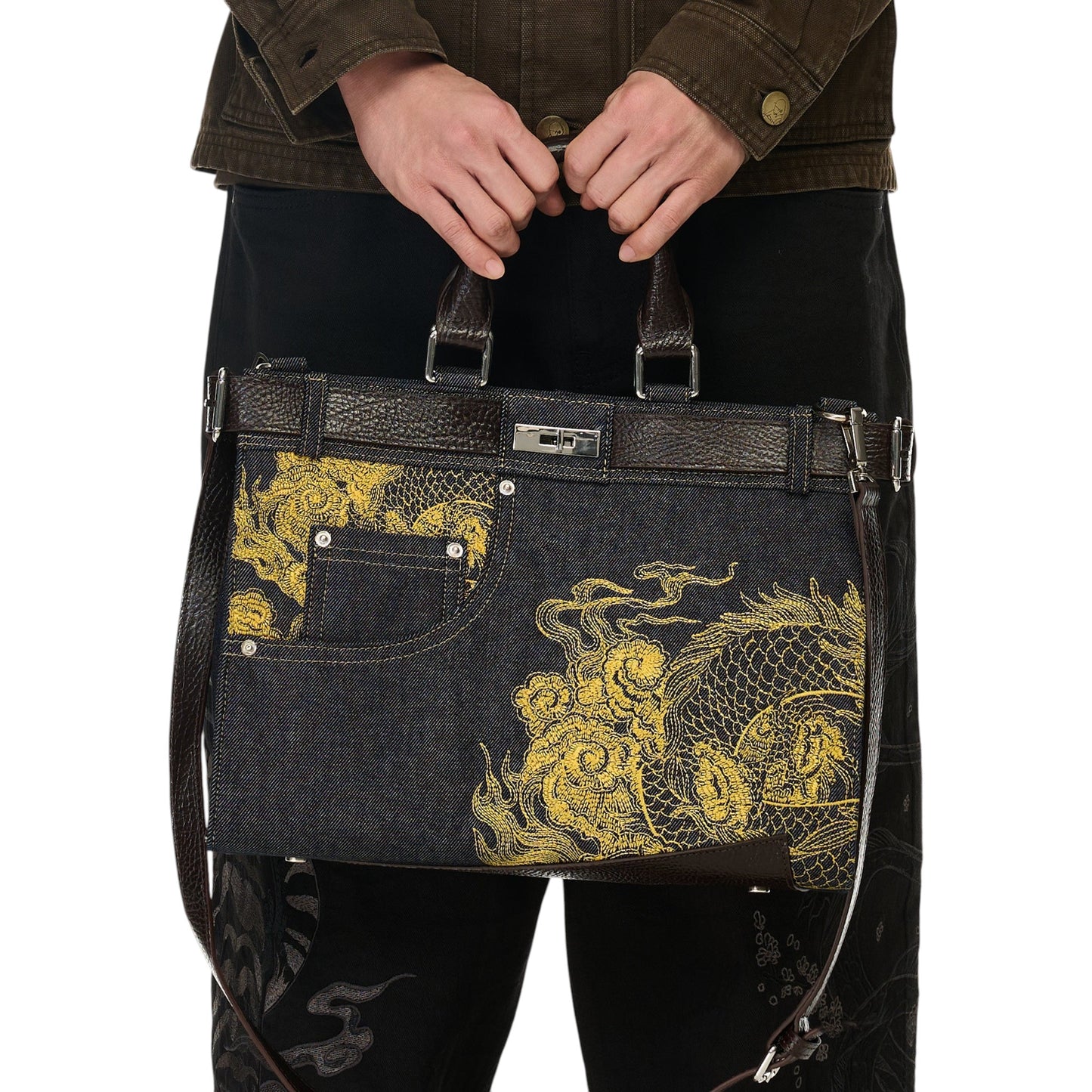 OFFCODE.USA yakuza v2 indigo raw denim handbag with yellow dragon embroidery, leather belt detail, and turn-lock.