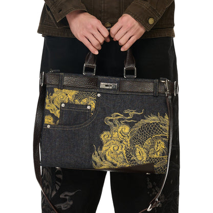OFFCODE.USA yakuza v2 indigo raw denim handbag with yellow dragon embroidery, leather belt detail, and turn-lock.