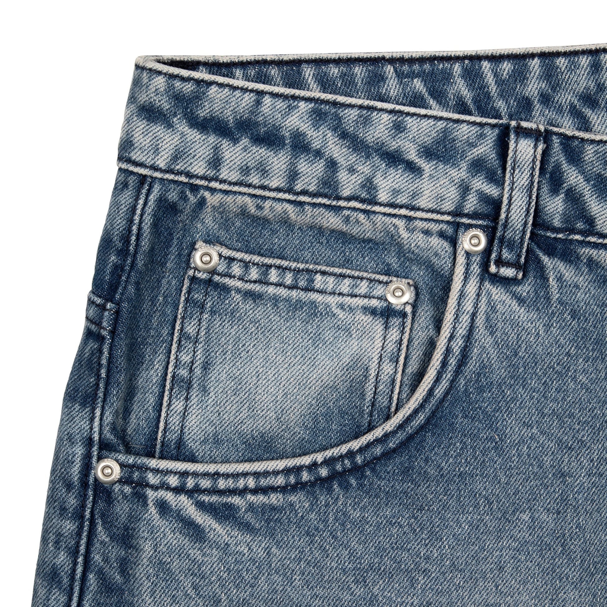 OFFCODE.USA gallery washed indigo denim jeans with embroidered back pockets and debossed leather patch. 100% cotton, baggy fit.