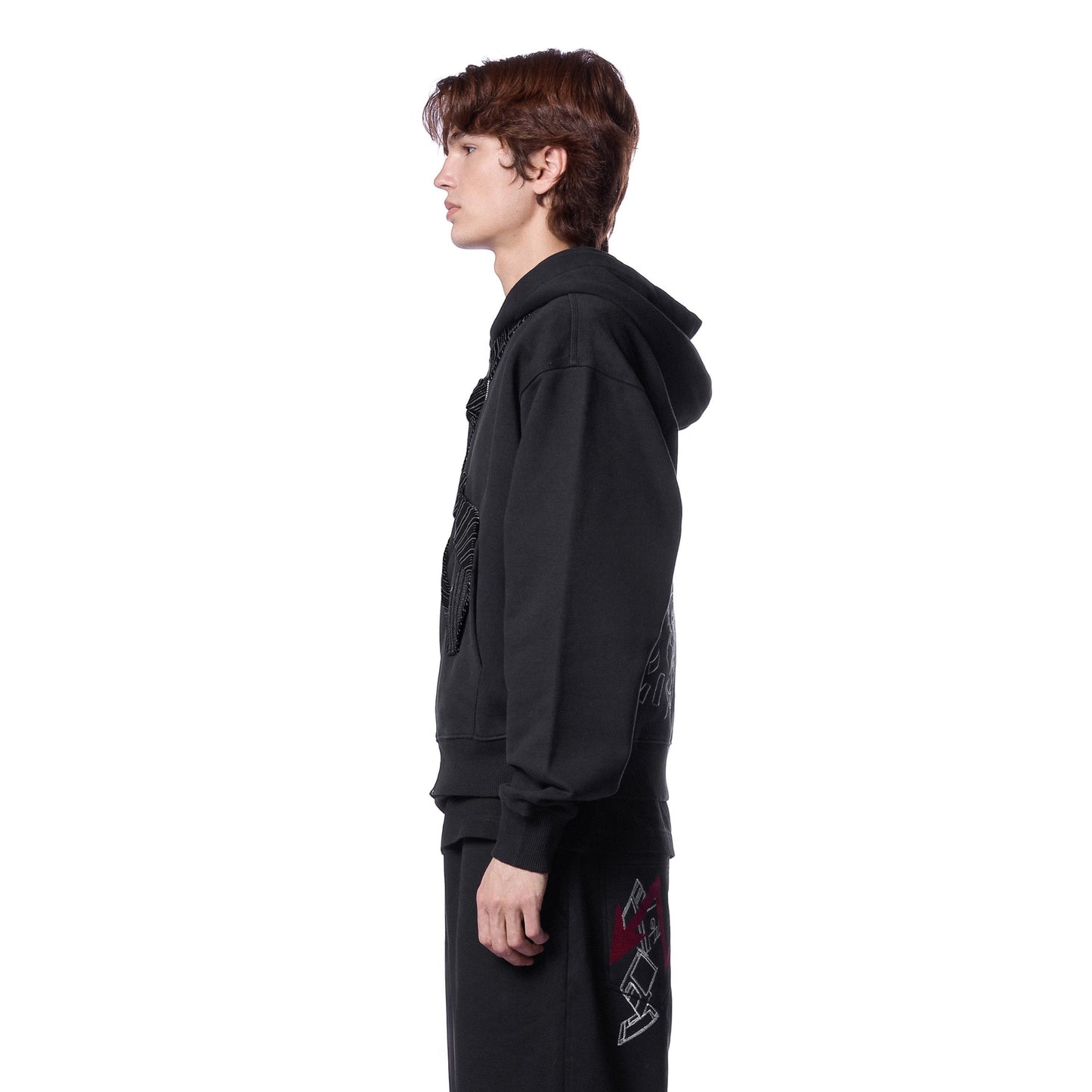 OFFCODE.USA black cotton zip-up hoodie with embroidered details on front and back. Model wearing size L.