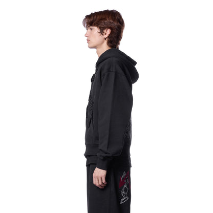 OFFCODE.USA black cotton zip-up hoodie with embroidered details on front and back. Model wearing size L.