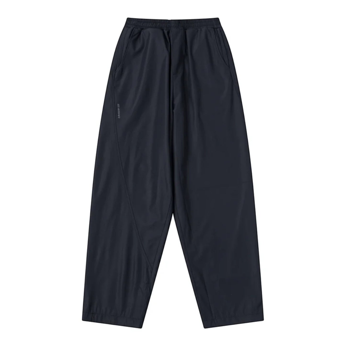 OFFCODE.USA dark navy tech joggers with asymmetrical paneling, reflective logos, and wide leg fit.