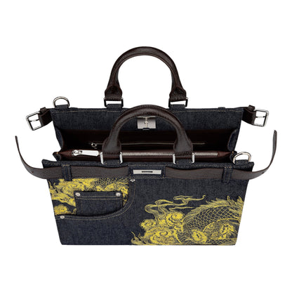 OFFCODE.USA yakuza v2 indigo raw denim handbag with yellow dragon embroidery, leather handles, and belt detail.