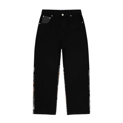 OFFCODE.USA black denim jeans with balloon fit, Japanese-style embroidery on the side seams and a raw denim coin pocket.